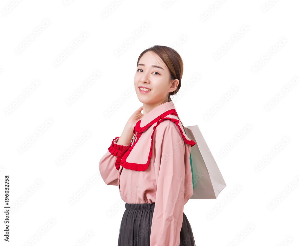 A girl with shopping bags. Shopping woman smiling. Isolated over white background. A girl with shopping bags. Shopping woman smiling. Isolated over white background.