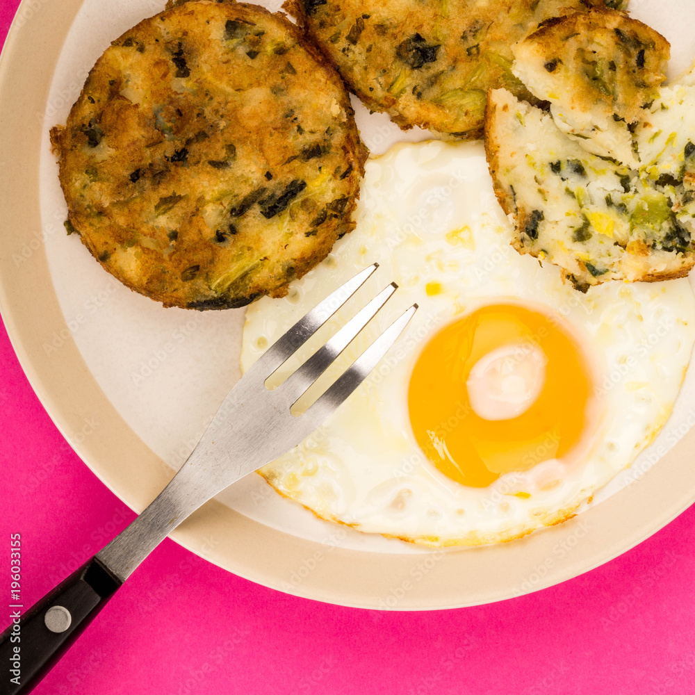 Cooked Vegetarian Bubble And Squeak Cakes With A Fried Egg Cooked Vegetarian Bubble And Squeak Cakes With A Fried Egg