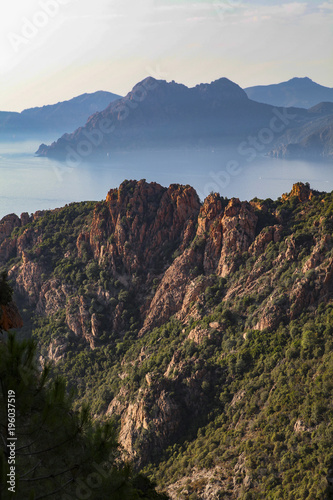 Corsica landscape with the red rocks and the sea