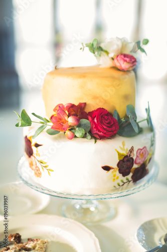 Luxury decorated wedding cake on the table © olegparylyak
