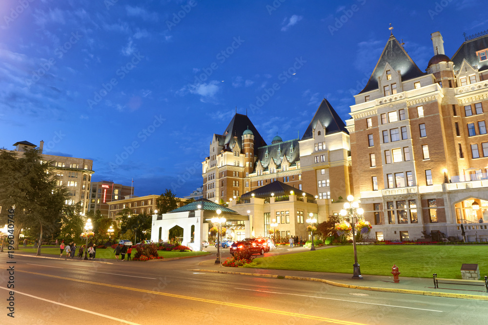 VICTORIA, CANADA - AUGUST 14,2017: Empress Hotel with city park. Victoria is the major city of Vancouver Island