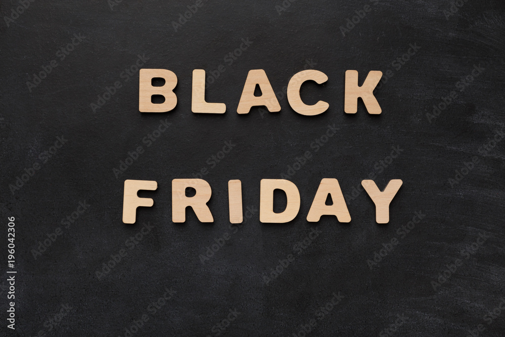 Black Friday spelled with wooden letters Black Friday spelled with wooden letters