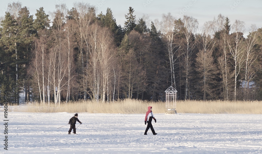 People walking on the frozen sea, Espoo, Finland