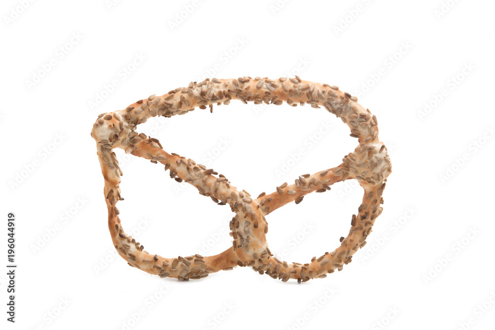Pretzel with seeds isolated on the white Pretzel with seeds isolated on the white
