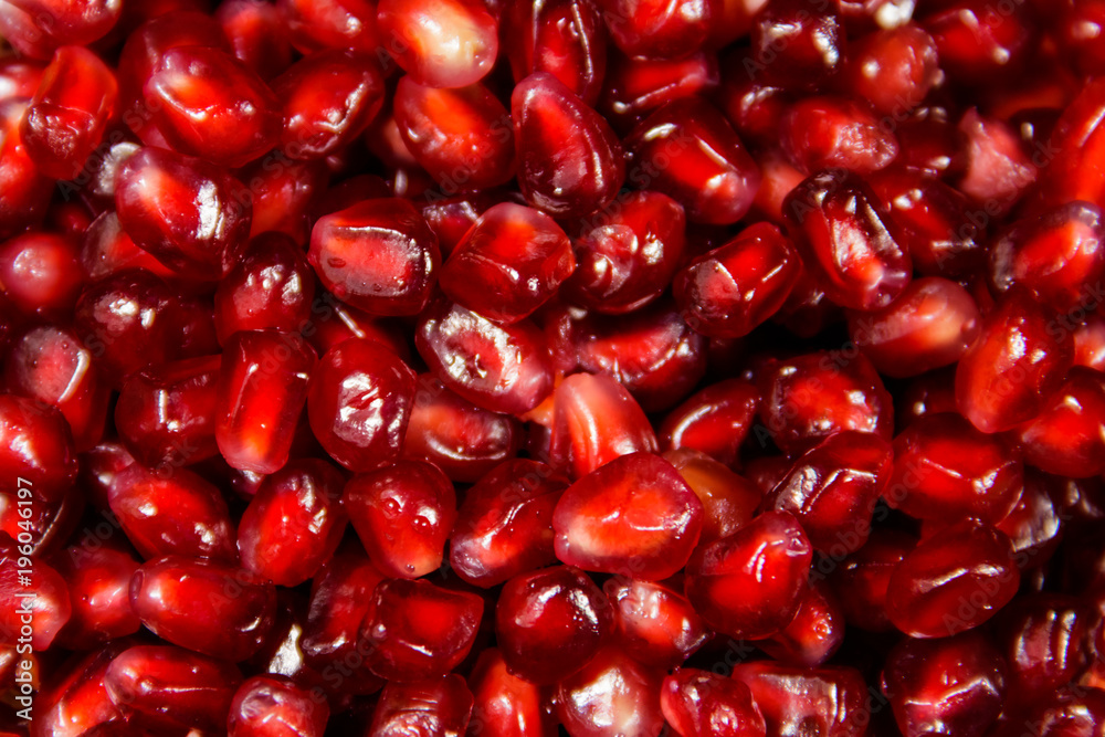 Food background of the fresh ripe pomegranate seeds Food background of the fresh ripe pomegranate seeds
