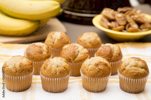 Classic Banana Nut Muffins in a Kitchen with Ingredients