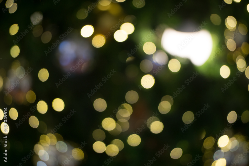 Defocused background, Light night bokeh abstract background, Glitter vintage lights background. Abstract Gold bokeh Christmas background. lens flare reflection beautiful circle glitter.