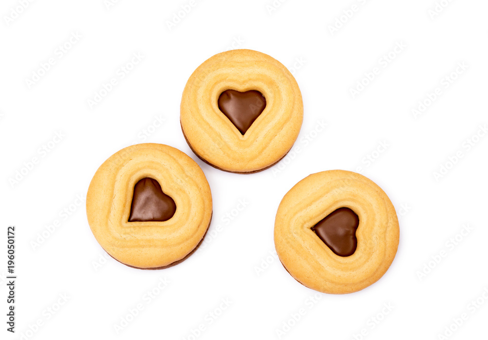 Chocolate heart in round biscuit isolated on white background