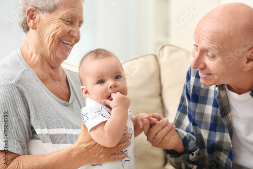 Senior couple with their li...