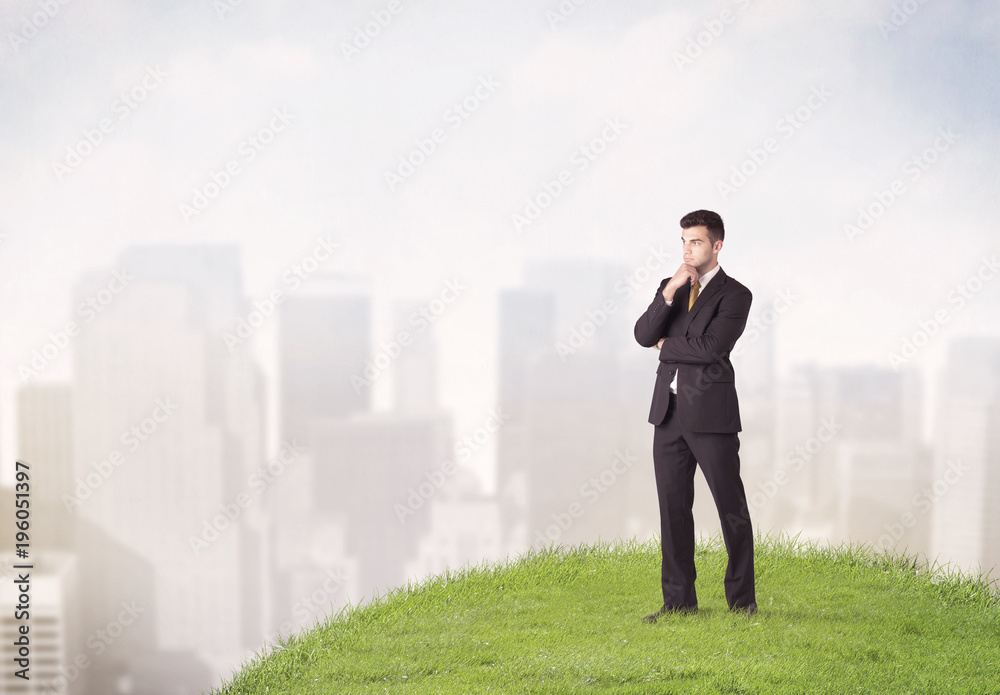 man standing in front of city landscape man standing in front of city landscape