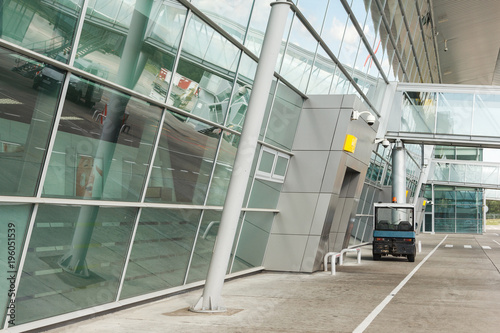 Connecting corridor at the airport. Aerospace and glass. Blue colored. terminal photo