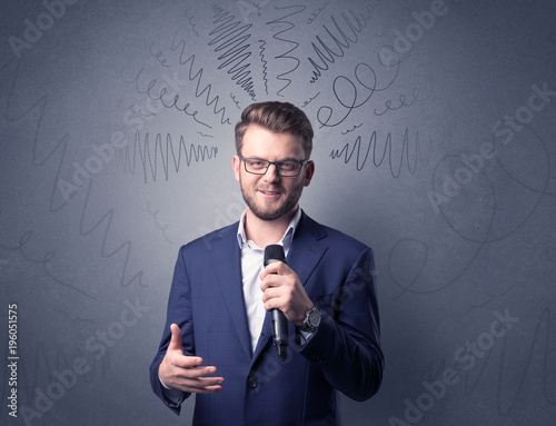 Businessman holding microphone
