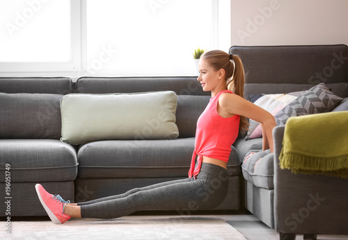 Beautiful young woman doing...