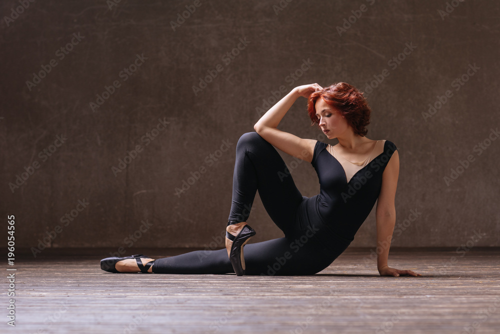 Young beautiful ballerina posing in studio Young beautiful ballerina posing in studio
