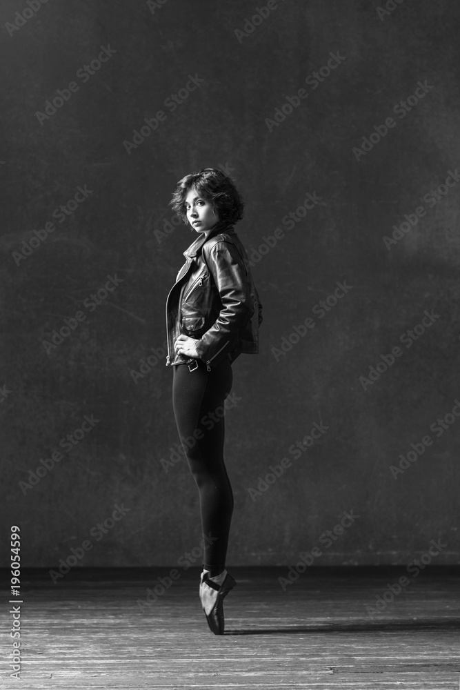 Young beautiful ballerina posing in studio Young beautiful ballerina posing in studio