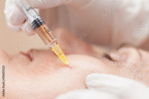 Photos close up of woman having mesotherapy treatment