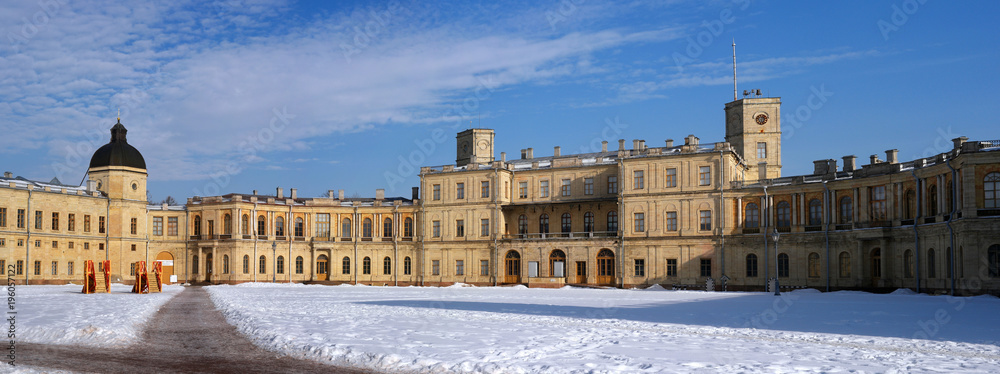 Gatchina Palace. Russia. Panoramic view of the Palace Square and the main entrance and the right wing of the palace with a watchtower. Winter photo.