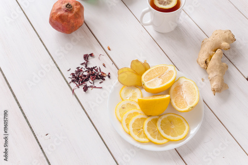 cold tea fruits on white wooden table