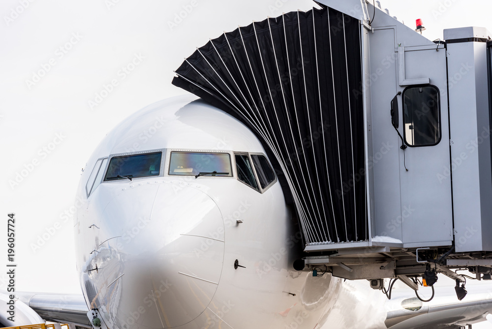 Aircraft and sleeve of a teletrap. Gate at the airport for