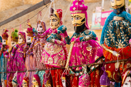 Traditional rajasthani puppets showing a couple with a bearded man and beautiful woman in traditional rajasthani apparel. These are famous tourist souveniers for travellers to Rajasthan