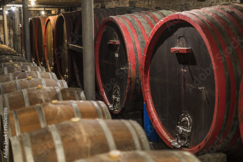 Barrels of wine in old cellar