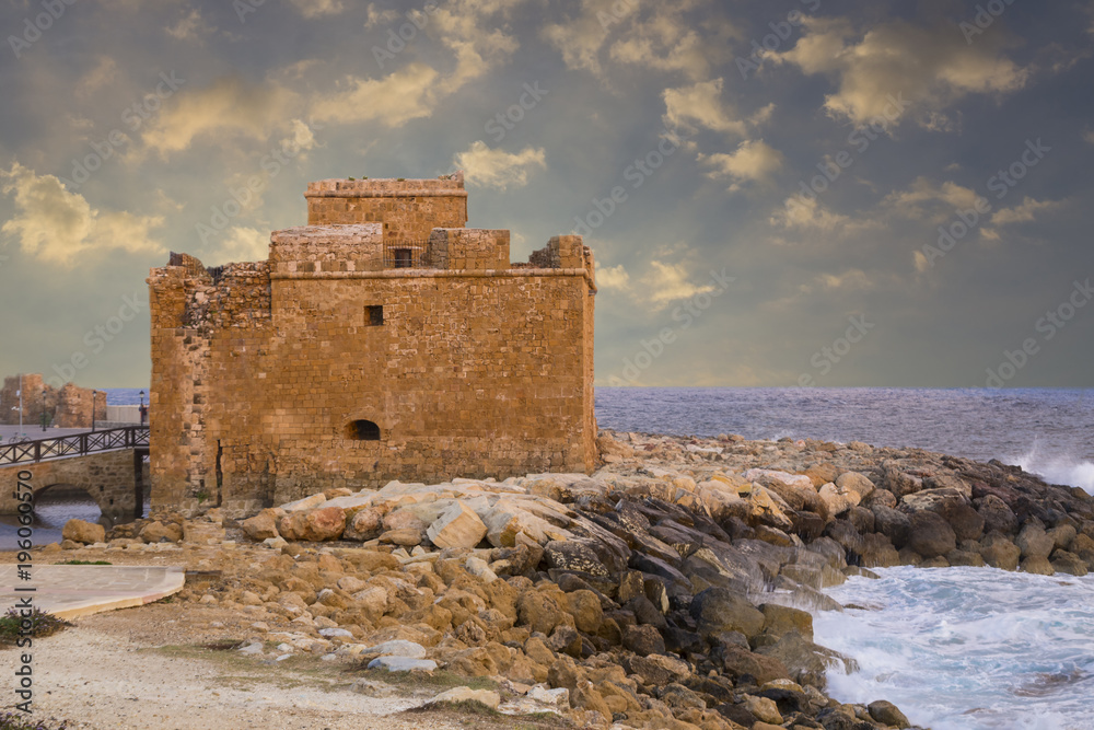 Medieval Paphos castle  on the seashore at sunset. Cyprus.