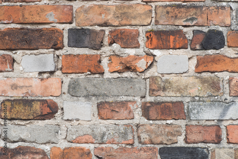Fototapeta premium old weathered brick wall background