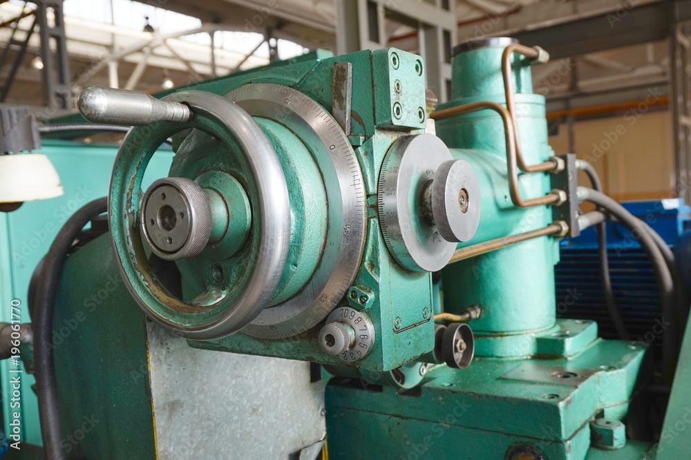 Scale feed on the machine for metal processing. Lathe, grinding and milling machine.