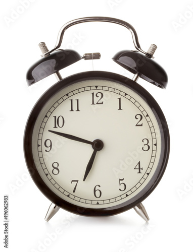 sinlge retro style alarm clock isolated on white background