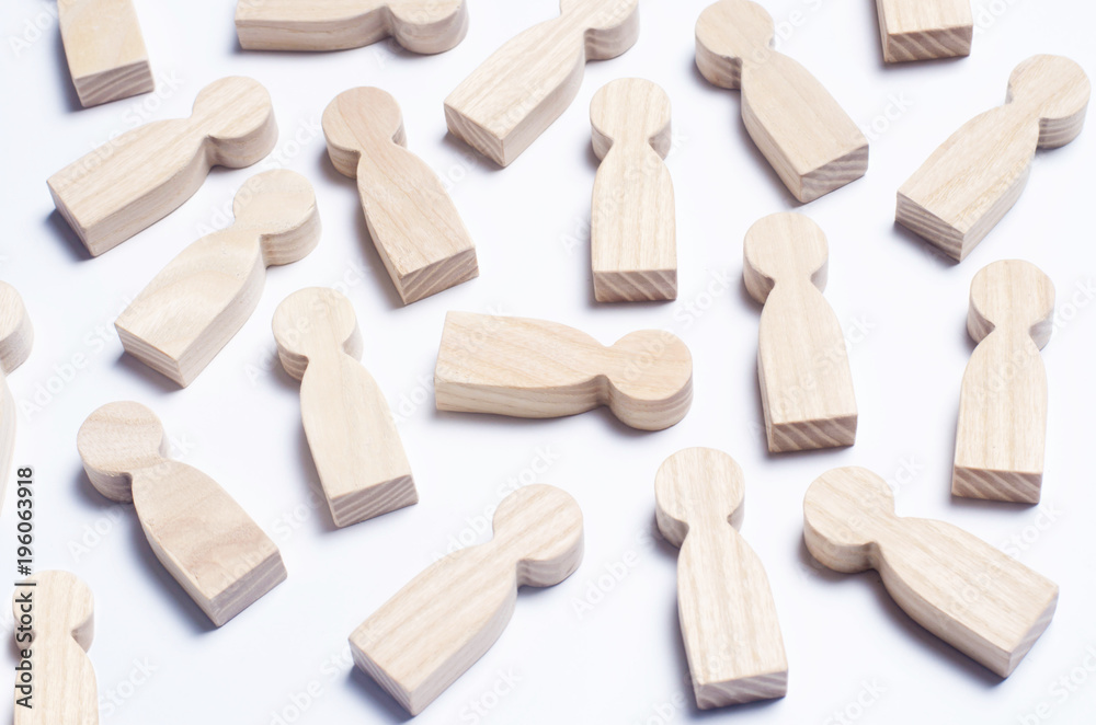 Wooden figures of people on a white background. The concept of society, collective, company, family, neighbors. A crowd of people at a meeting, rally. Workers, employees, citizens. Kids toys. Close up Wooden figures of people on a white background. The concept of society, collective, company, family, neighbors. A crowd of people at a meeting, rally. Workers, employees, citizens. Kids toys. Close up