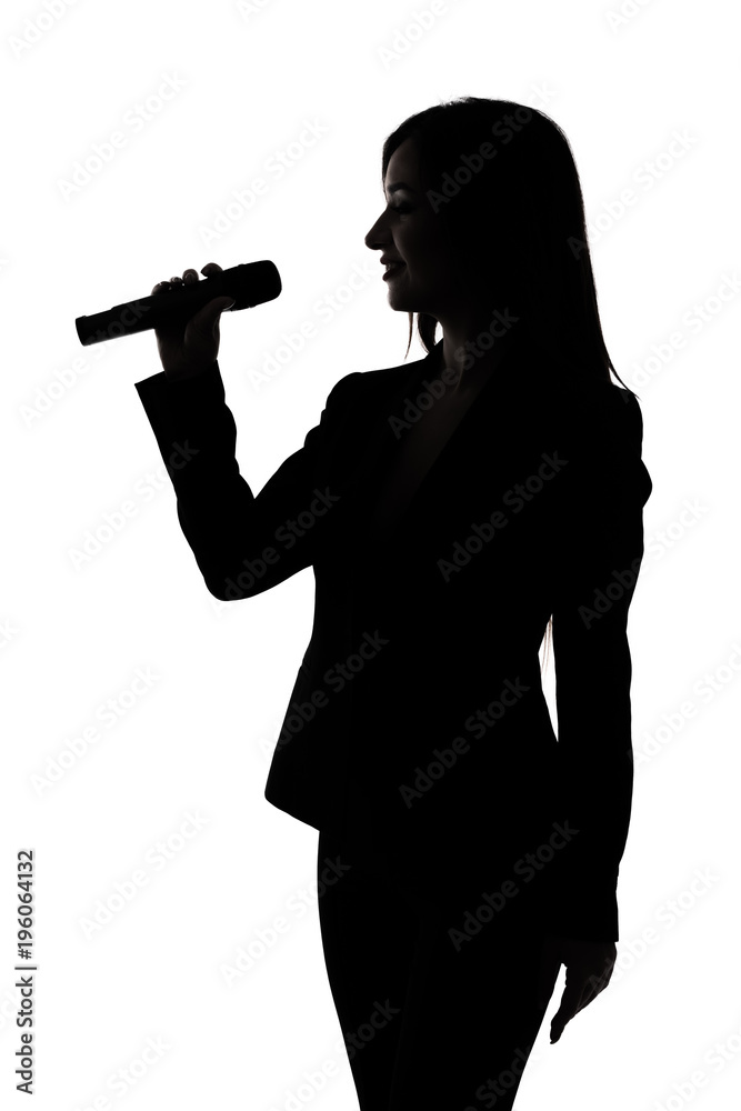 silhouette of a woman singing with a microphone in hands on white. Show woman.