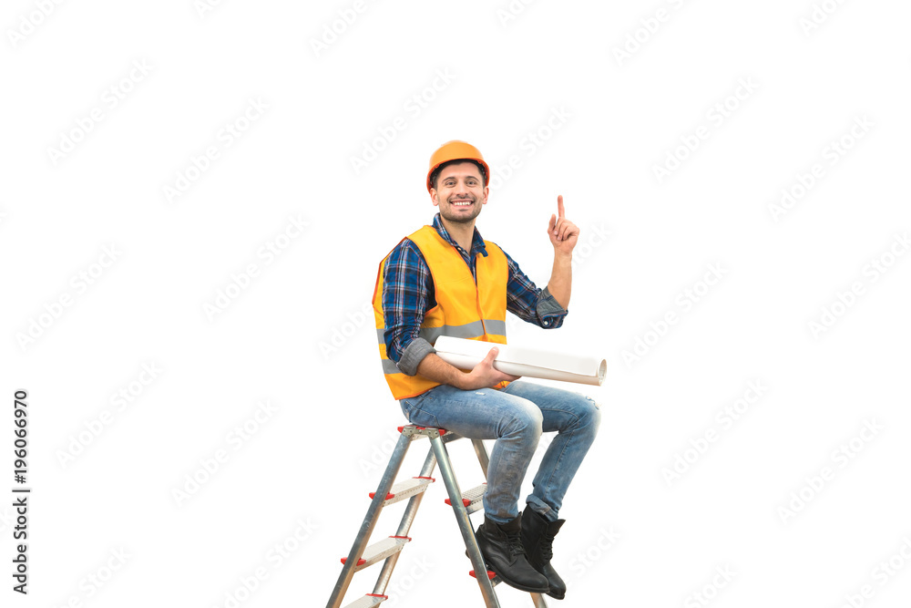 Naklejka premium The builder sitting on the ladder and gesturing on the white background
