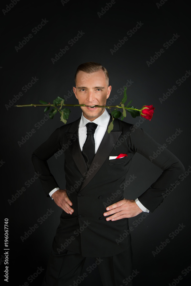 Ballroom dancer in suit with flower for valentines day Ballroom dancer in suit with flower for valentines day