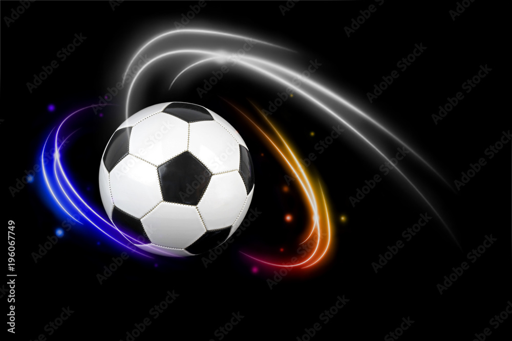 Naklejka premium Soccer ball with colorful effects on black background.