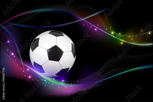 Soccer ball with colorful effects on black background. © Hayati Kayhan