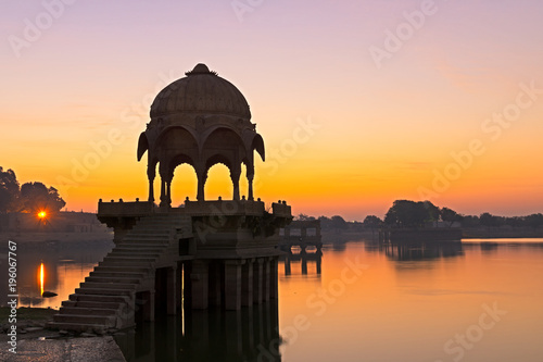 Sunrise over Gadi Sagar Temple in Gadisar lake  Jaisalmer  Rajasthan India