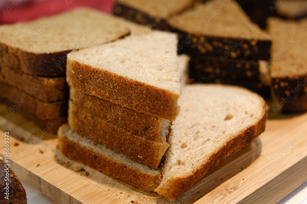 Cut pieces of bread of different varieties sceup photo
