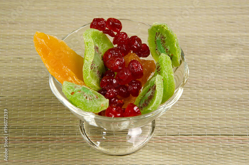 Different dried fruits on a plate.