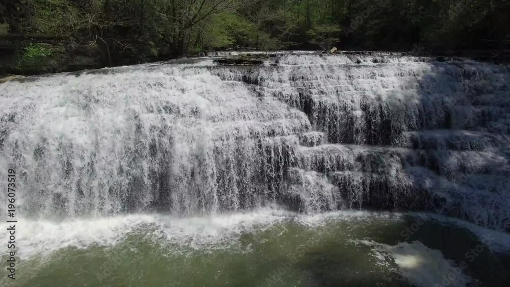 Rising High Over Cascading Waterfall Rising High Over Cascading Waterfall