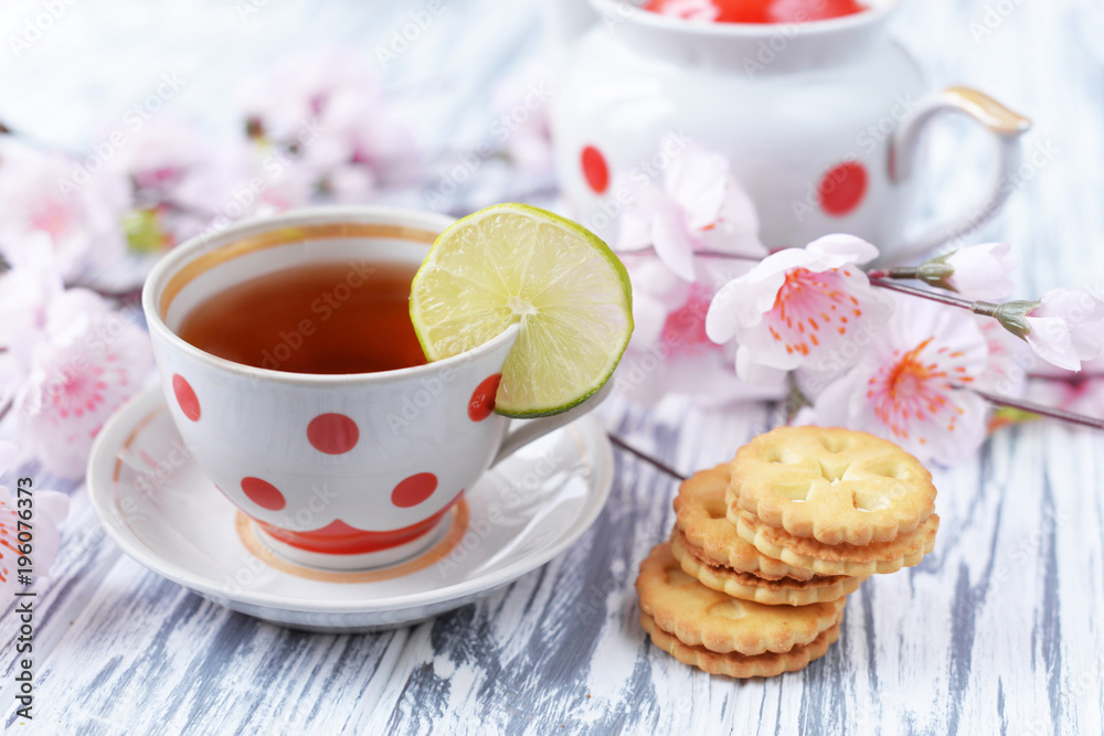 morning breakfast of tea in a cup of colorful peas with cookies morning breakfast of tea in a cup of colorful peas with cookies