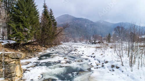View of a mountain river in the Carpathians in winter