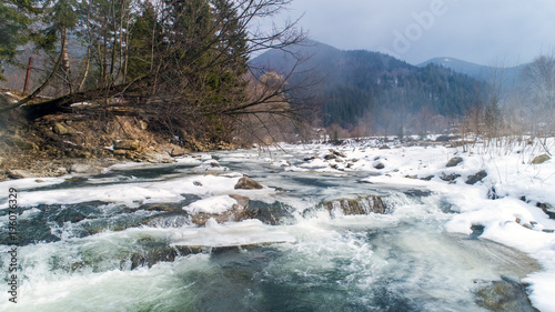 View of a mountain river in the Carpathians in winter photo