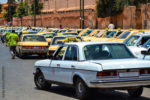 Obraz na płótnie Cabs waiting for clients at a taxi station of Marrakech (Morocco) w salonie