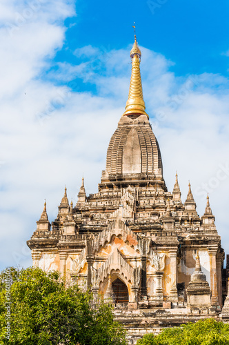 View of the facade of the building of the Shwegugyi temple in Bagan  Myanmar. Copy space for text. Vertical.