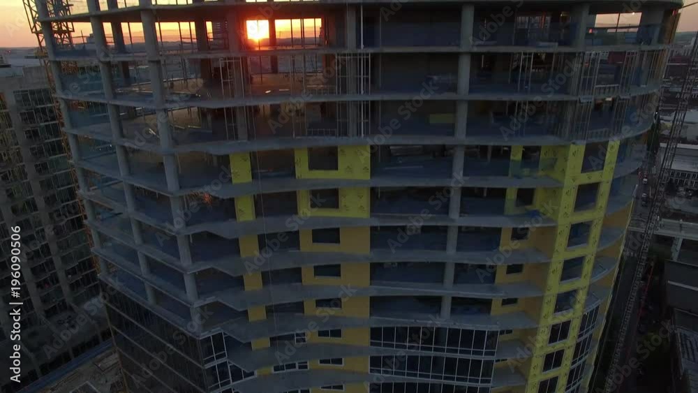 Fast Rising As Setting Sun Flickers Through New Skyscraper Fast Rising As Setting Sun Flickers Through New Skyscraper