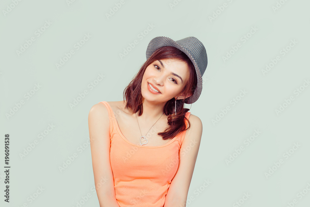 woman in gray hat smiling looking at you camera woman in gray hat smiling looking at you camera