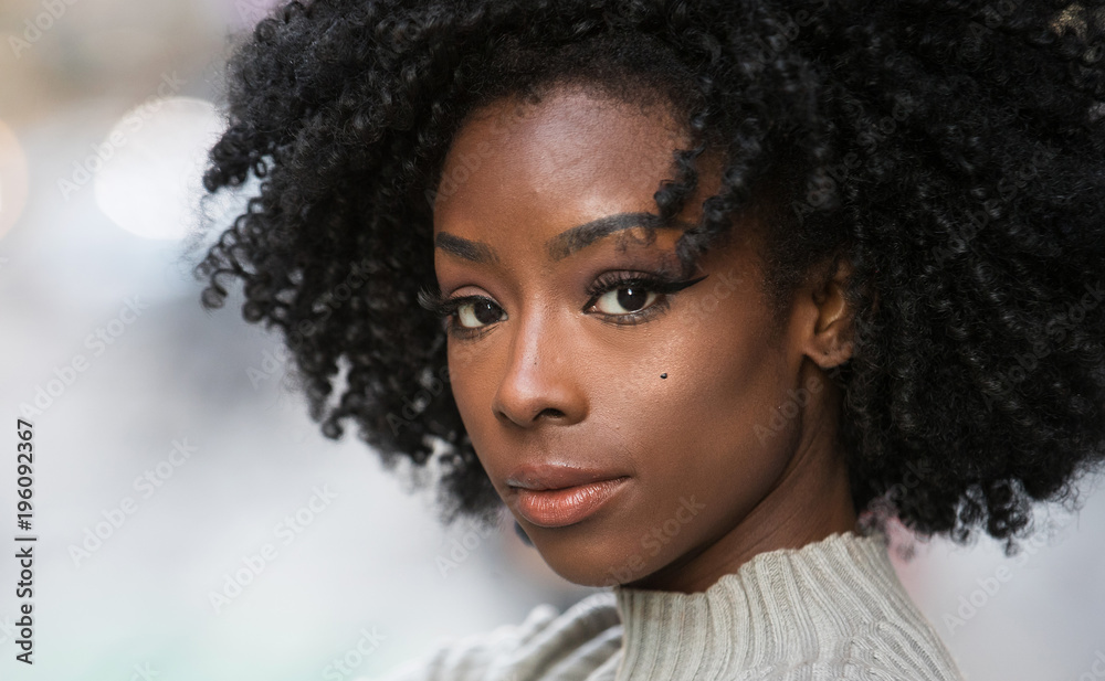 Beautiful African American with black, curly hair