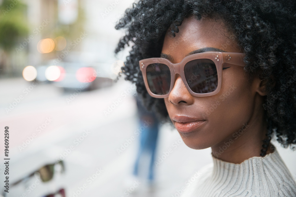 African American Woman with dark sunglasses African American Woman with dark sunglasses