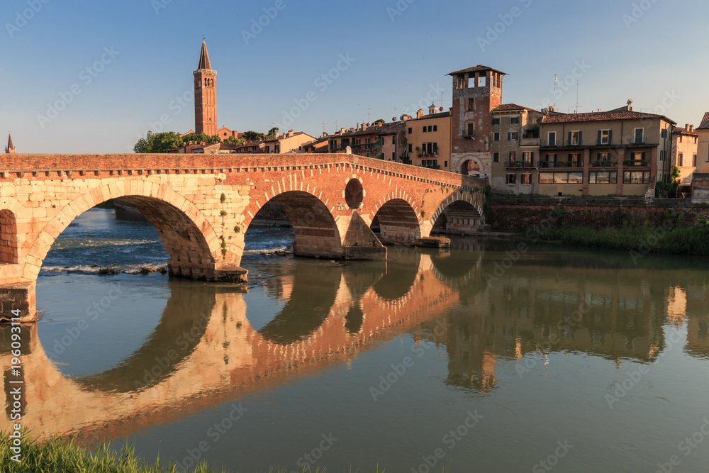 Verona cityscape with Ponte Pietra on Adige river with historical buildings