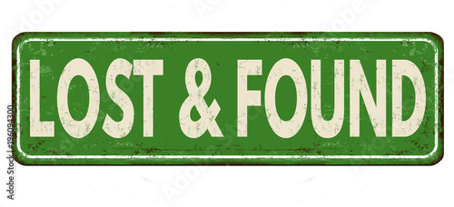 Lost and found vintage rusty metal sign